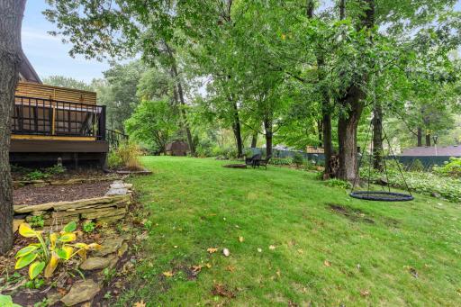Imagine relaxing, playing and entertaining in this GREAT, fenced in backyard