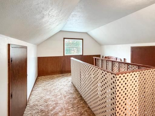 Upstairs area - with storage on both sides
