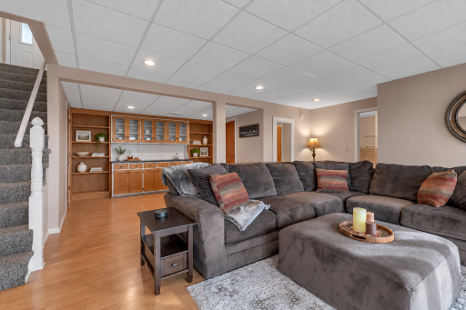 The lower level wet bar is an added bonus while entertaining friends and family (virtually decorated wet bar)