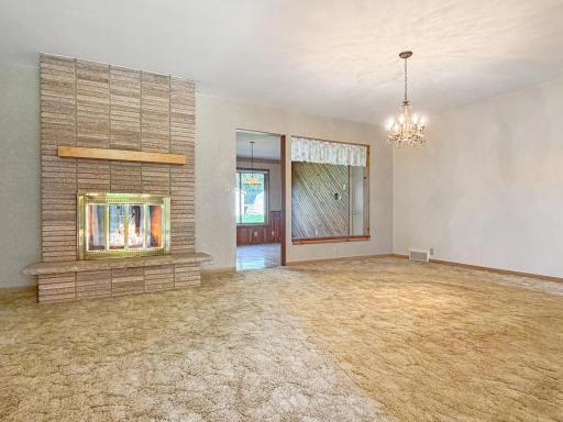 Spacious Living Room w/ wood burning fireplace