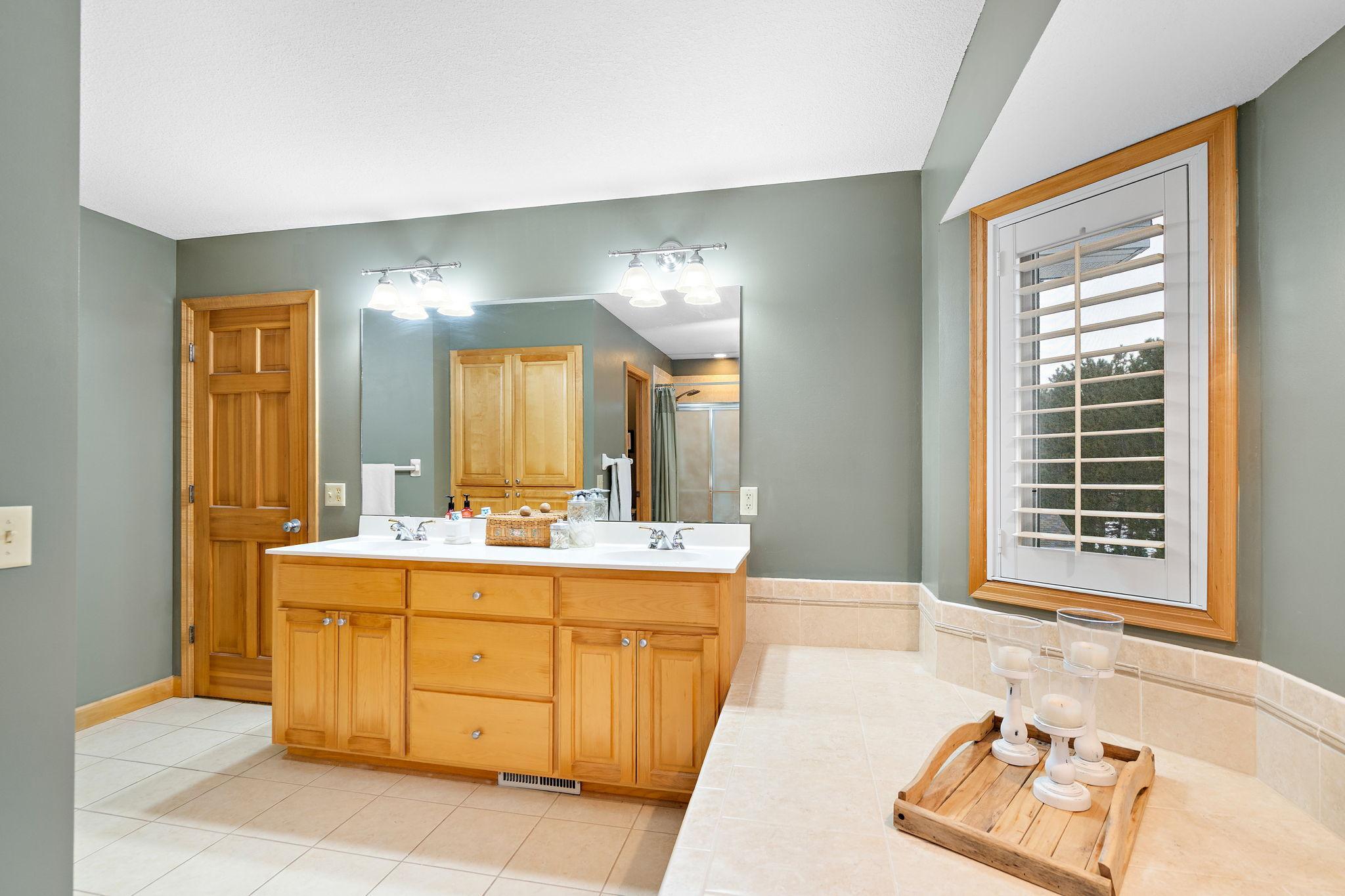 Double sinks and custom cabinets.