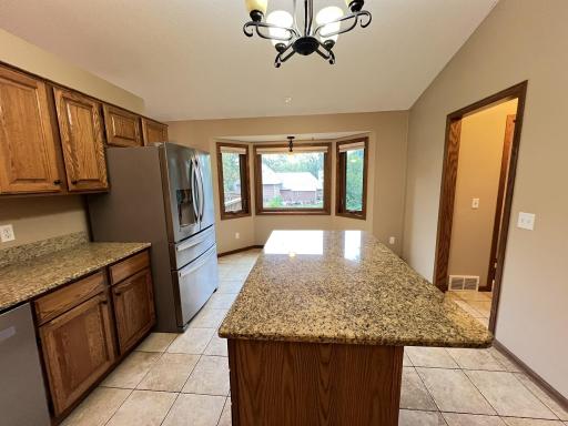 Kitchen also has newer stainless steel appliances.