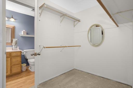 The walk-in closet opens to the bathroom
