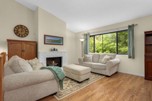 The living room features laminate flooring...