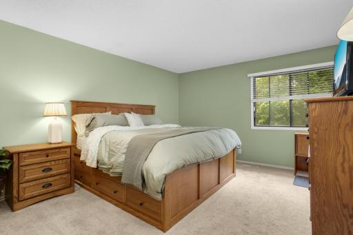 The spacious primary bedroom