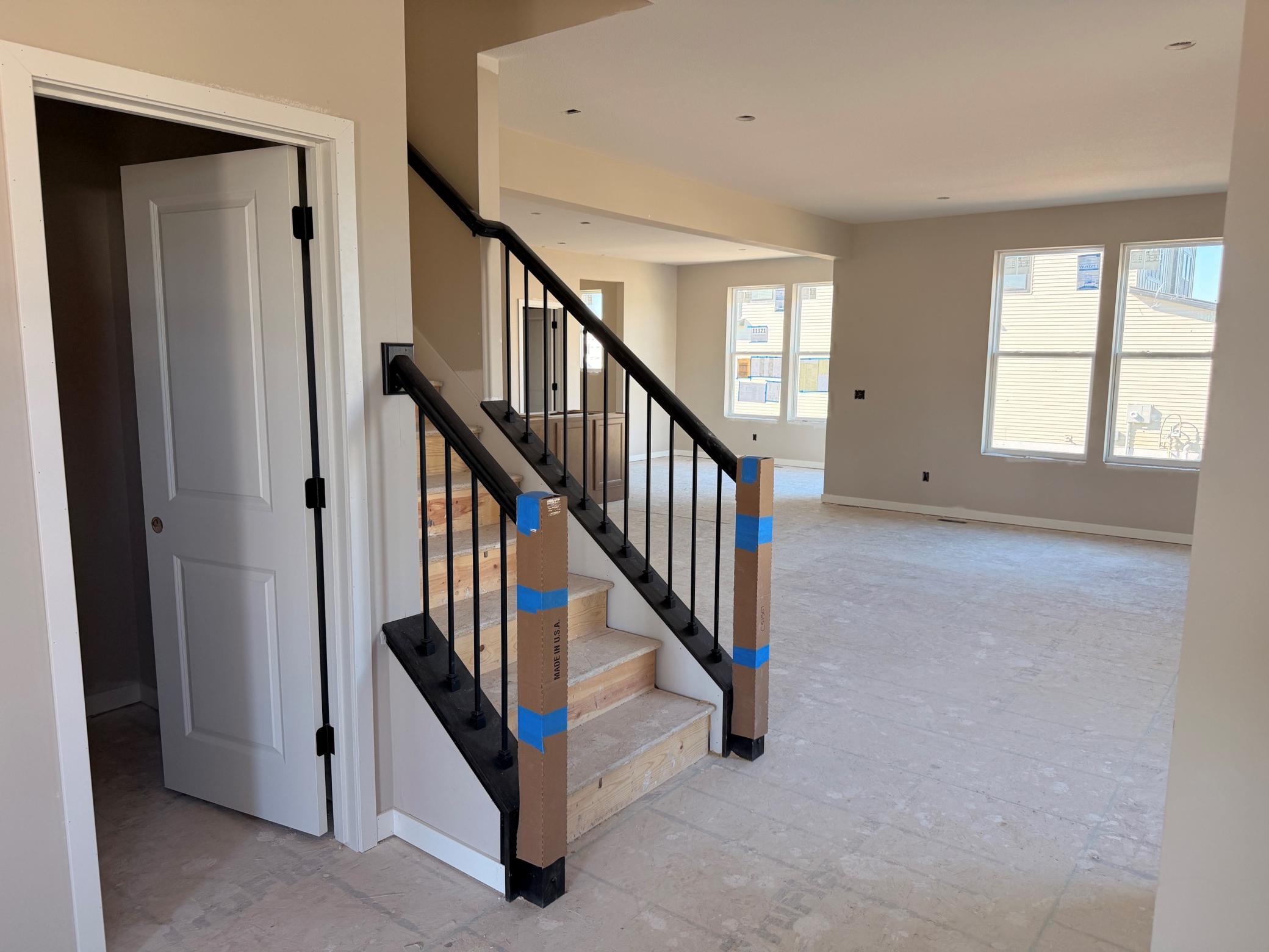 Open-concept design allows seamless flow from the kitchen to dining and living spaces—ideal for hosting and connection.