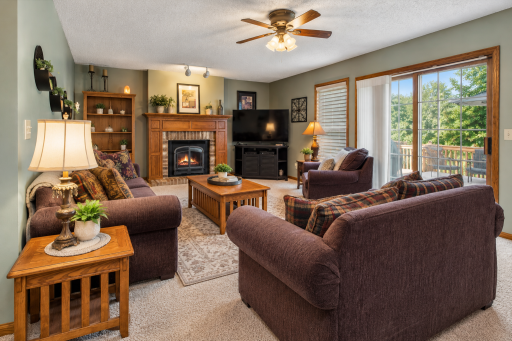 Warm and inviting family room with access to deck