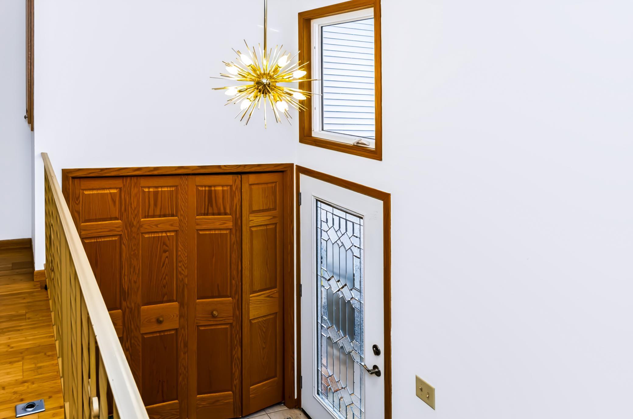 Seller added the window above the door for natural light.