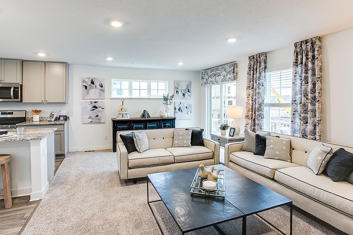 Lots of windows and a sliding door to your private outdoor space. *Model home, colors and selections will vary.