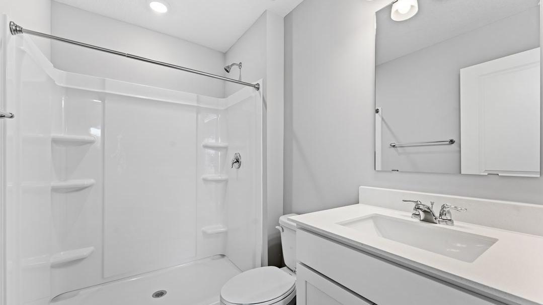Primary bathroom. *Model home, colors and selections will vary.
