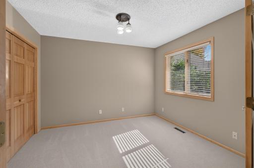 A great 2nd bedroom perfect for guest room, den, or home office!