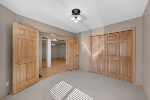 Another view of the 2nd bedroom. Great potential to move laundry into closet to bring on main floor!