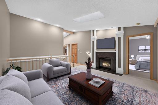 Virtually staged living room and primary bedroom.