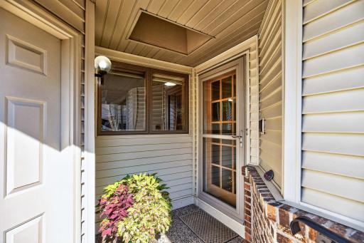 The inviting front porch is a great space to start your day or relax at night.