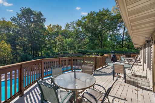 Sunfilled deck overlooks the pool area.
