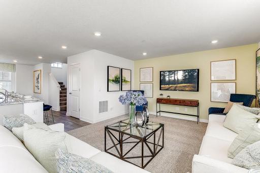 Spacious enough to host game night, but perfect for movie night! *Model home, colors and selections will vary.