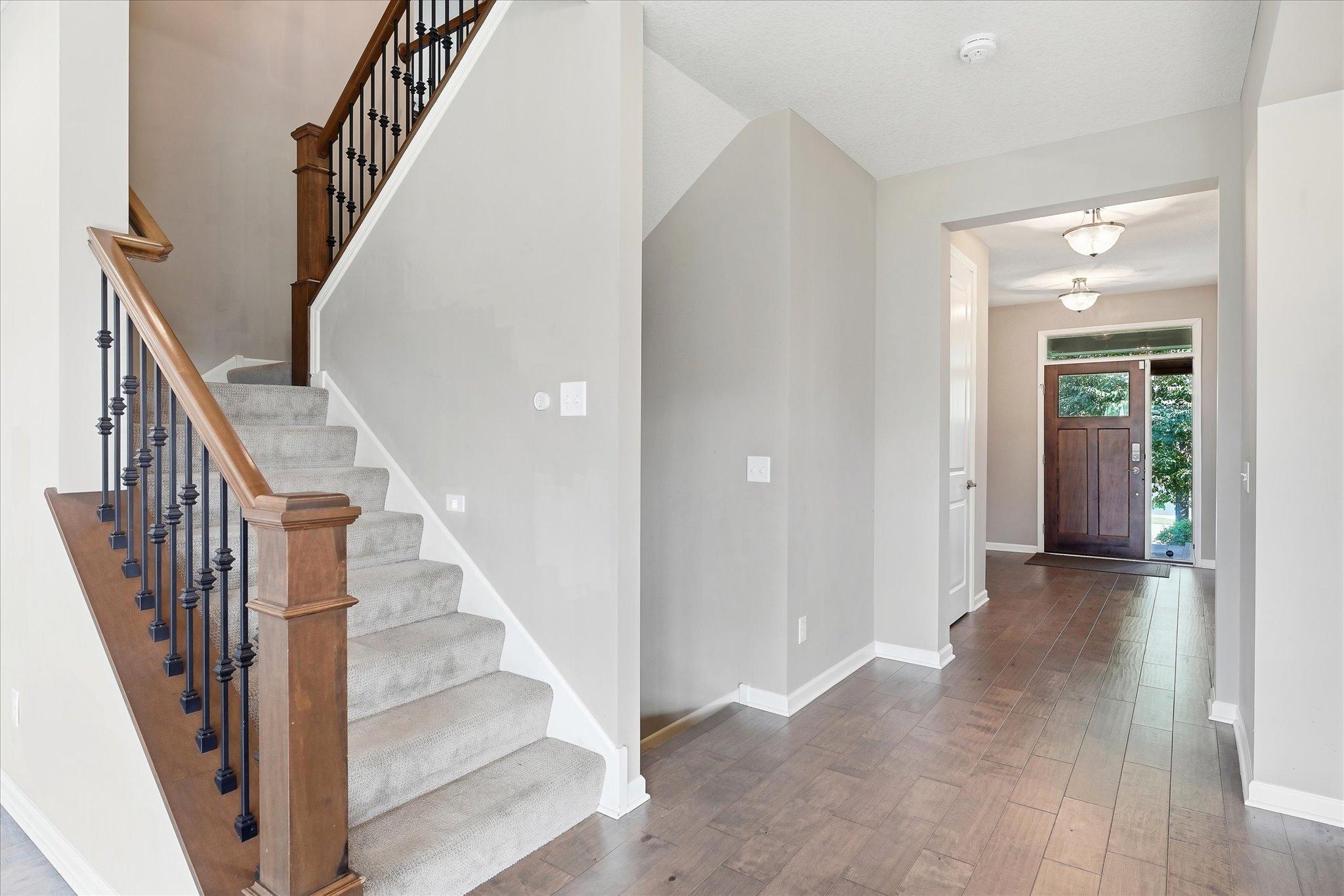 a better view of the size of the entry area, and the hardwood plank floors