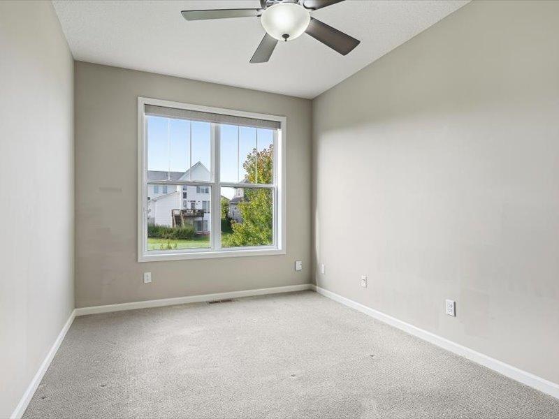 At the back of the home is a small office/den/ could be used as a bedroom (no closet). flex room