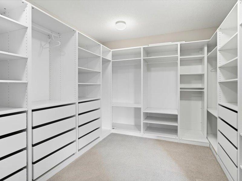 Anyone is going to love this nicely organized primary bedroom closet
