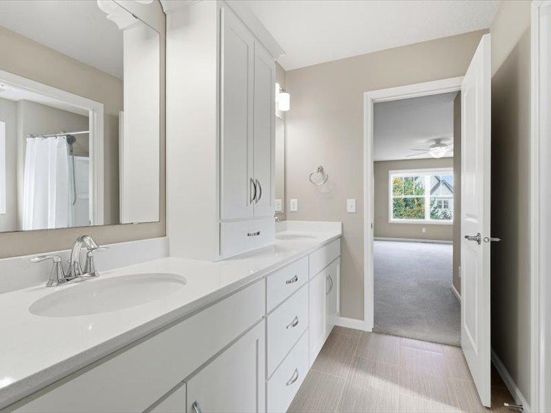 Jack and Jill bath dividing a front bedroom 3 and back bedroom 2 Lots of cabinet space