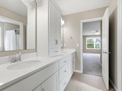 Jack and Jill bath dividing a front bedroom 3 and back bedroom 2 Lots of cabinet space