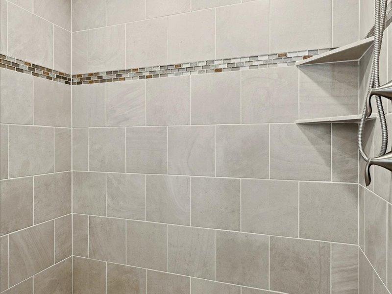 Beautiful tile work thruout the primary bath