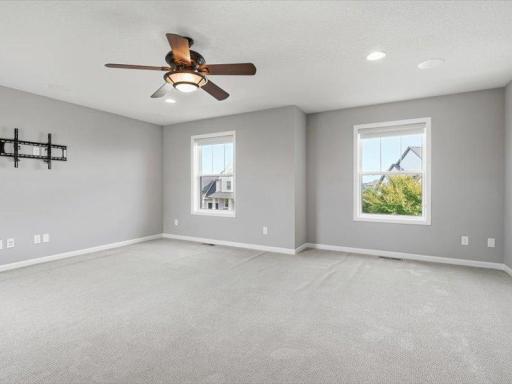 Upper family room also has a tv mount, plus ceiling fan