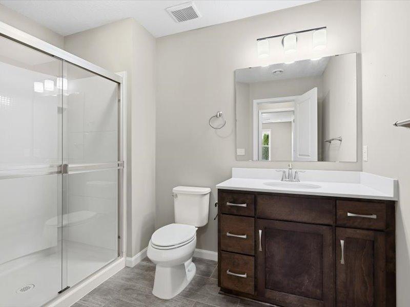 Handy 3/4 bath just off family room and bedroom 5