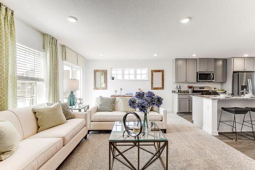 Spacious enough to host game night, but perfect for movie night! *Model home, colors and selections will vary.