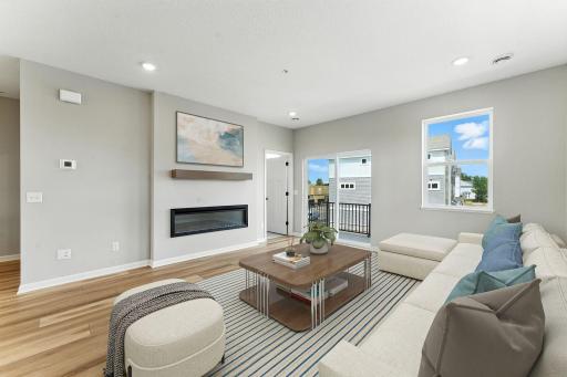 Living Room. Photo of previous model home, options and color selections may vary.