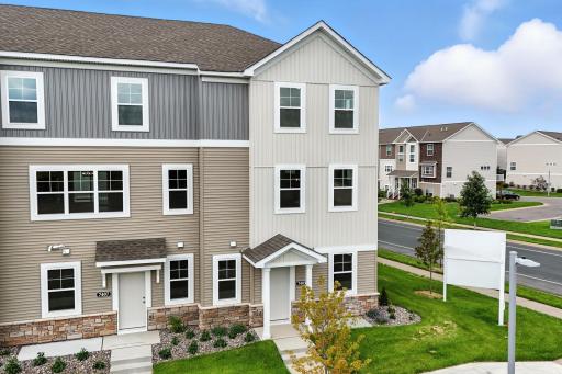 Illustration of the end unit Capri. Photo of previous model home, options and color selections may vary.