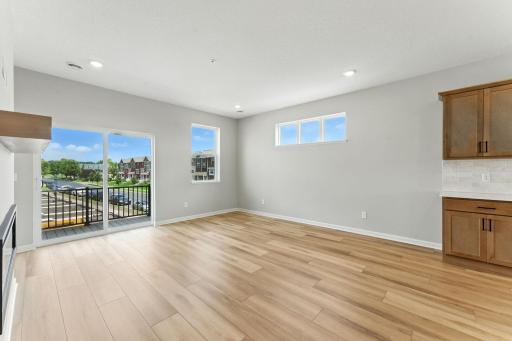 Family Room and Outside Deck. Photo of previous model home, options and color selections may vary.