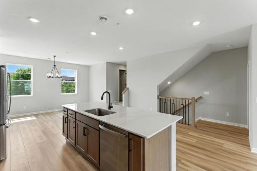 Capri Large Center Island for Serving 4 Guests. Photo of previous model home, options and color selections may vary.