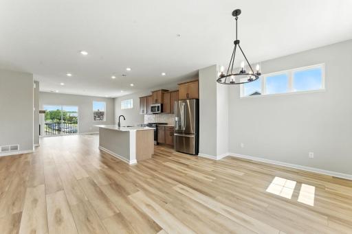 Main Level Living with Additional Natural Lighting. Photo of previous model home, options and color selections may vary.