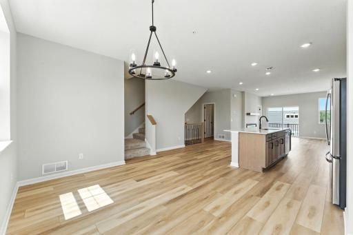 Casual Dining Area Huge Space for Larger Families and for Entertaining. Photo of previous model home, options and color selections may vary.