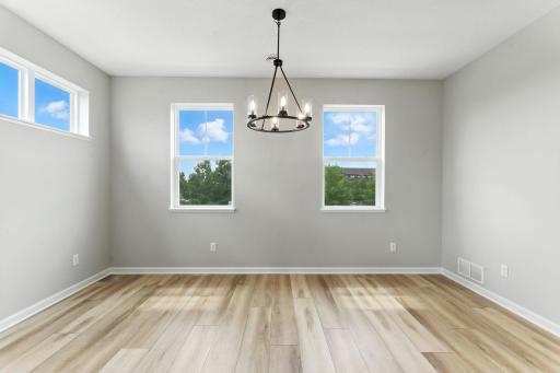 Dining Room in the Capri. Photo of previous model home, options and color selections may vary.