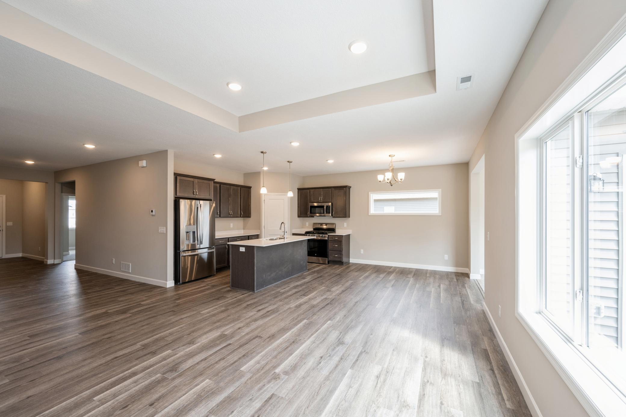 Living room - photos are of a completed inventory home of the same floorplan. Colors and selections may differ.