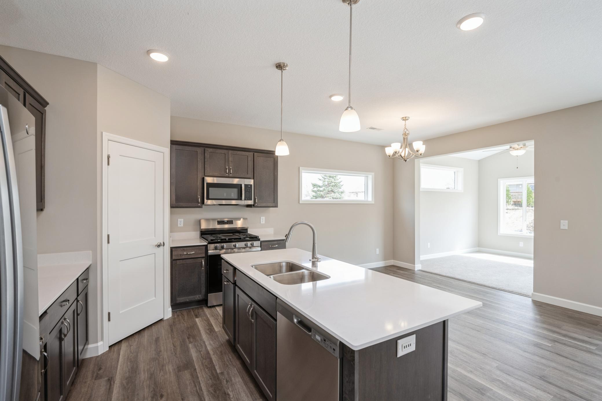 Kitchen - photos are of a completed inventory home of the same floorplan. Colors and selections may differ.