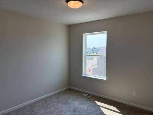 The secondary bedrooms are perfectly sized for everyone.