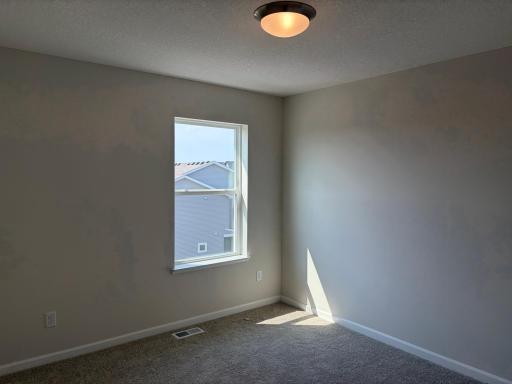 The secondary bedrooms are perfectly sized for everyone.