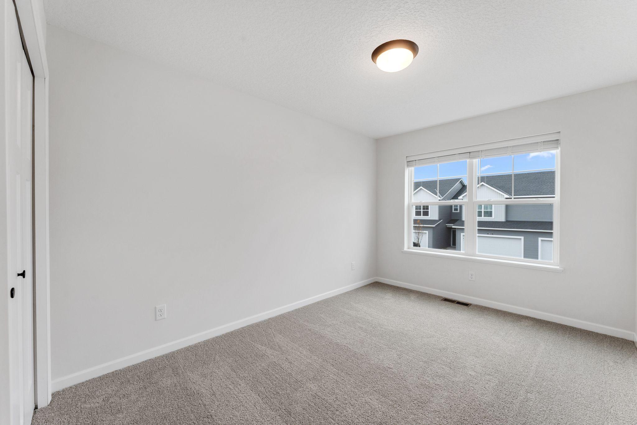 Secondary Bedroom. Photo is for representational purposes only. Not the actual home.