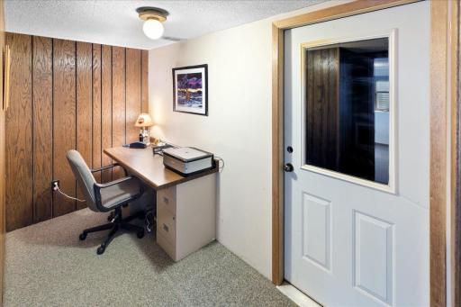 Convenient lower-level office space offering a dedicated area for working from home, studying, or managing household tasks.