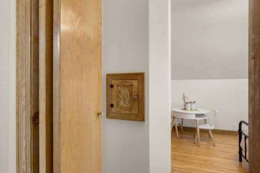 The second floor laundry chute is found just as you enter the second upstairs bedroom.