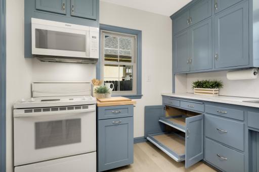Modern conveniences have been retroactively added-soft close drawers and doors as well as sliding shelves for ease of use.