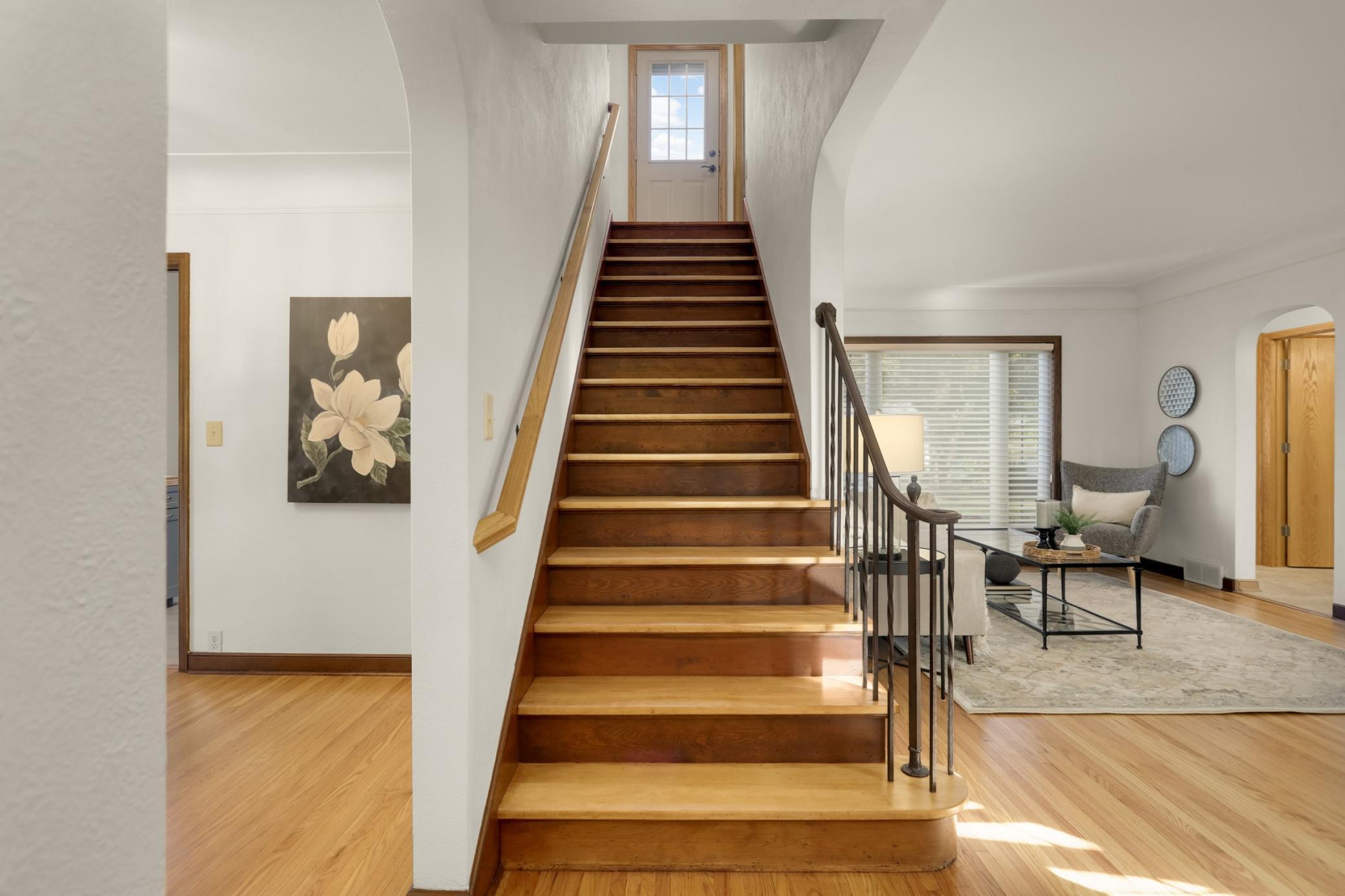 This lovely staircase welcomes you as you enter. Hardwood runs throughout the first and second floors. The hardwood floors were all refinished earlier this year.