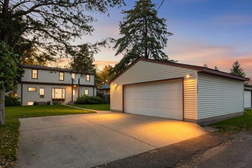 Large garage (built in 1999) is just off the alley for easy access.