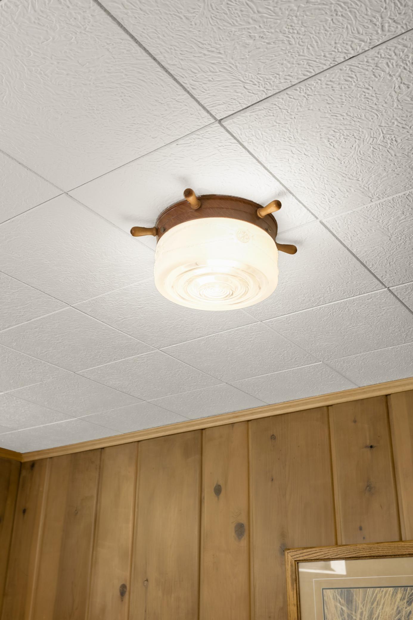 Mid-century nautical light fixture found throughout the lower level finished rooms. Absolutely fabulous!