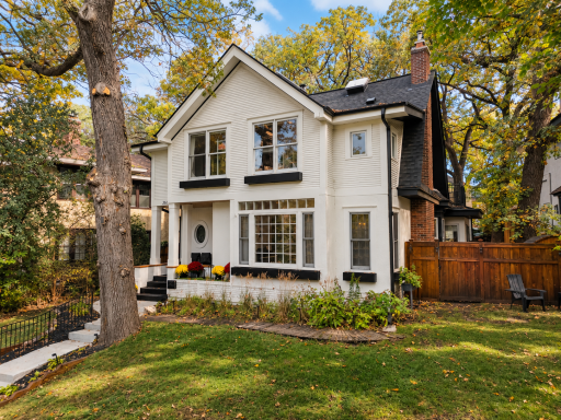 Distinctive Kenwood home with extensive exterior updates and beautiful mature-tree setting.
