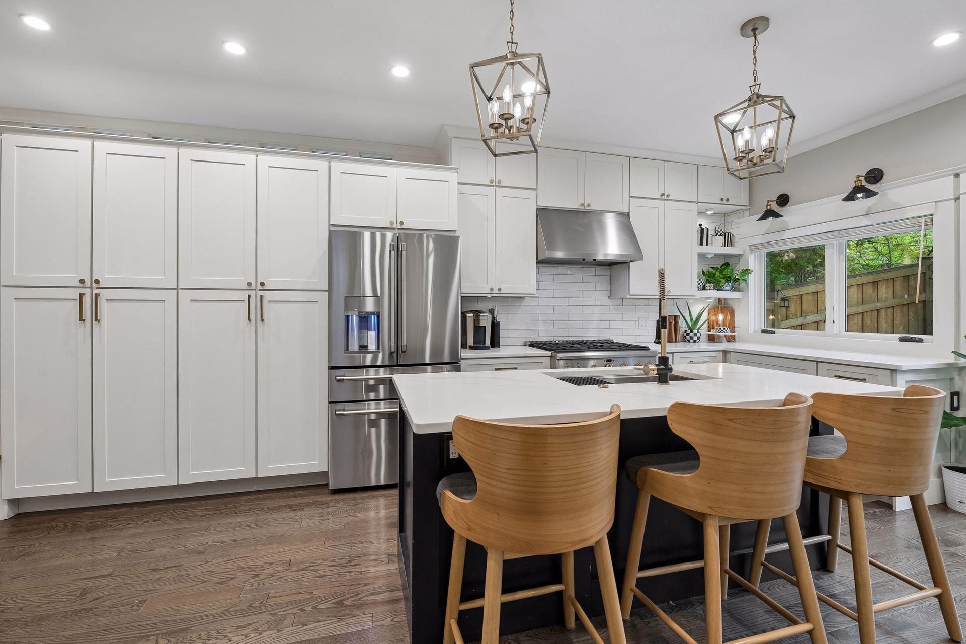 Kitchen renovation includes cabinetry, quartz counters and appliances new in 2021.