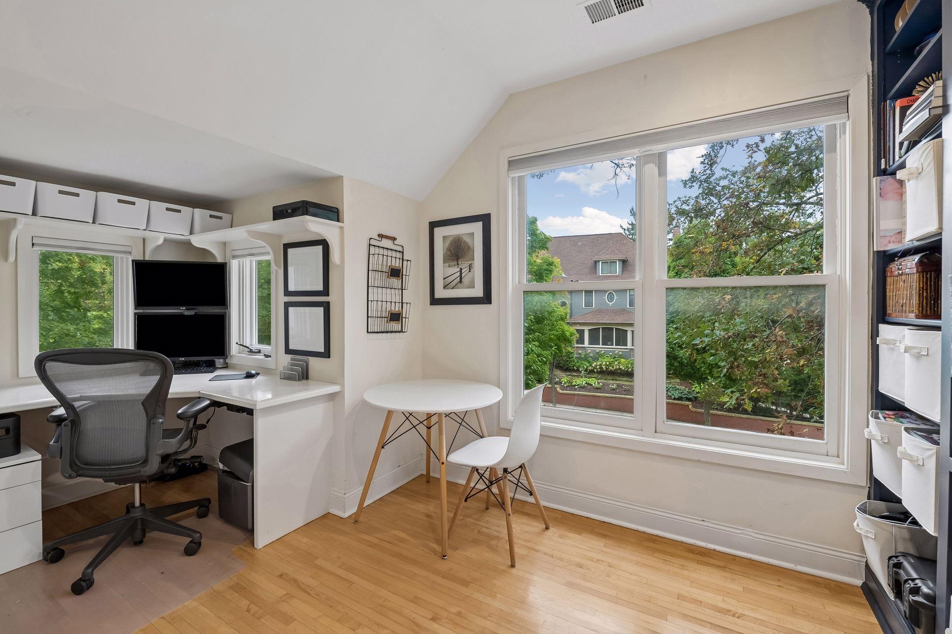 Bright upper level room makes an ideal office, homework or creative space